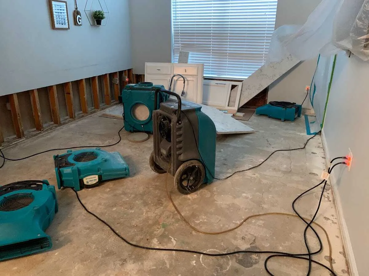 Dehumidifier in flood-cut room for Water Damage Restoration in Dakota Dunes